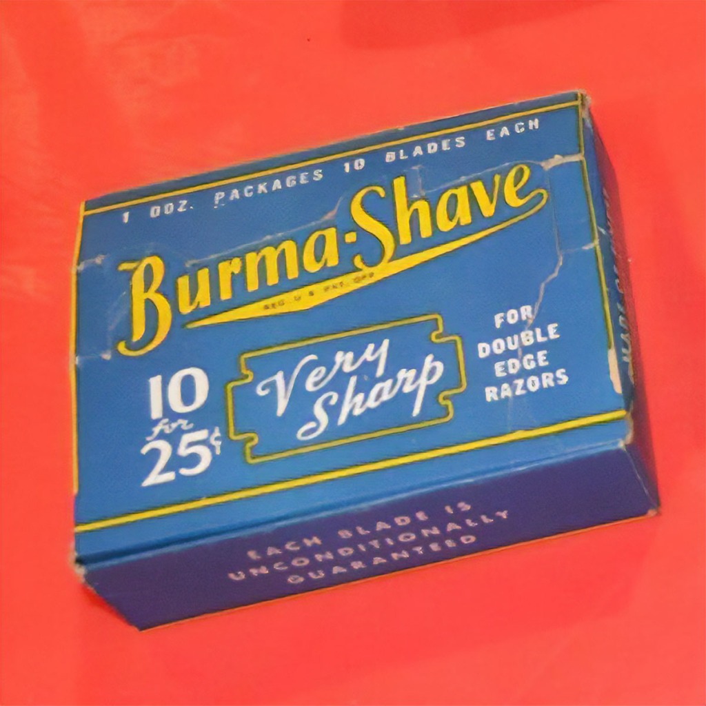 A blue cardboard case of little boxes of razor blades. The case says "10 for 25 cents" and "Very Sharp" and "For double edge razors."